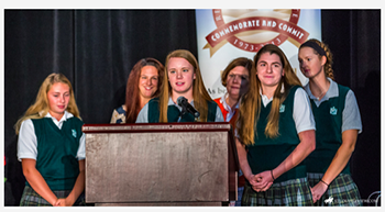 Sophomore Kara Greger, Mrs, Hammell, junior Helen Ann Stone, Mrs. Sudekum, junior Maggie Hannick, and junior Lauren Gallagher accept the Bishop McNicholas Award on Oct. 22.