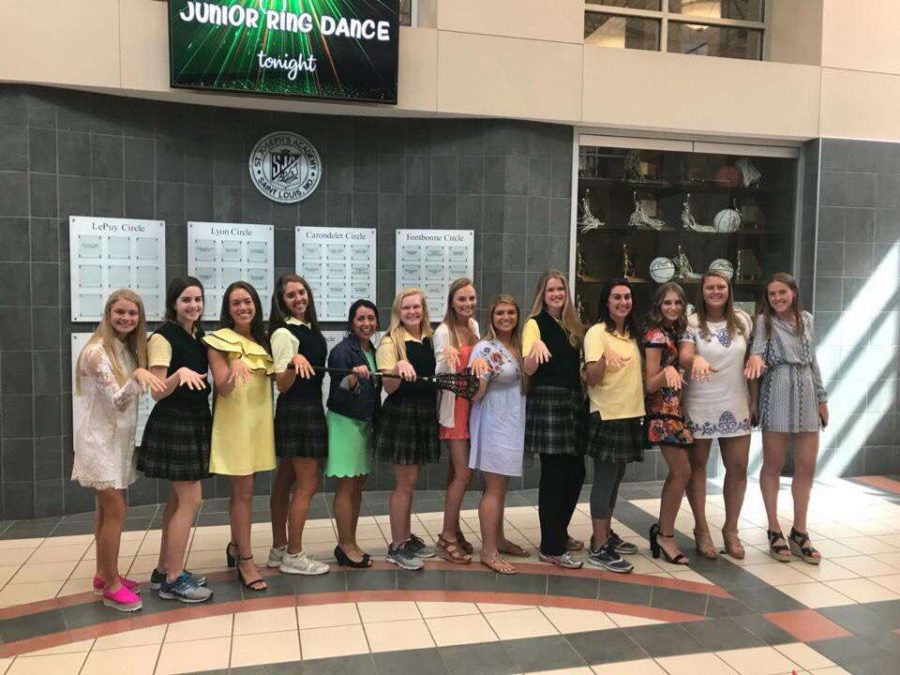 St Joe Lacrosse players gather on Ring Day to show their school spirit.