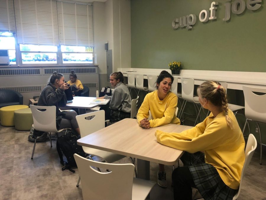 Students, including senior Maria Haro, enjoy time interacting with friends and off their phones during Unplugged Day.  Photo by: Greta Sea