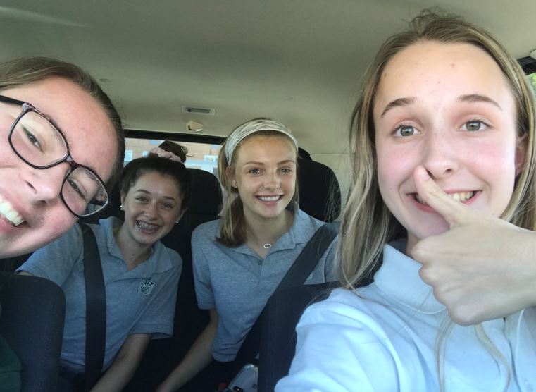 Junior Rachel Esser, Sophomore Julia Erker, Freshman Anna Vincent, and Junior Haley Pruett, carpool of the month, on their way to ST. Joe.