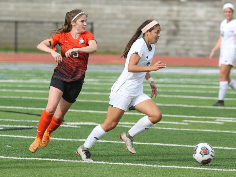 St. Josephs Greta Seal (right) makes a run as Summits Anna Walsh chases during a Class 3 soccer sectional on Monday, May 20, 2019 at Summit High School in Fenton, Mo. Paul Kopsky.