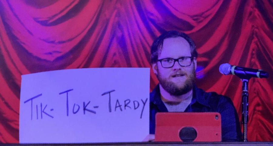 Mr. Jendraszak explains what Tik-Tok-Tardy means at the 2019 Faculty Show.