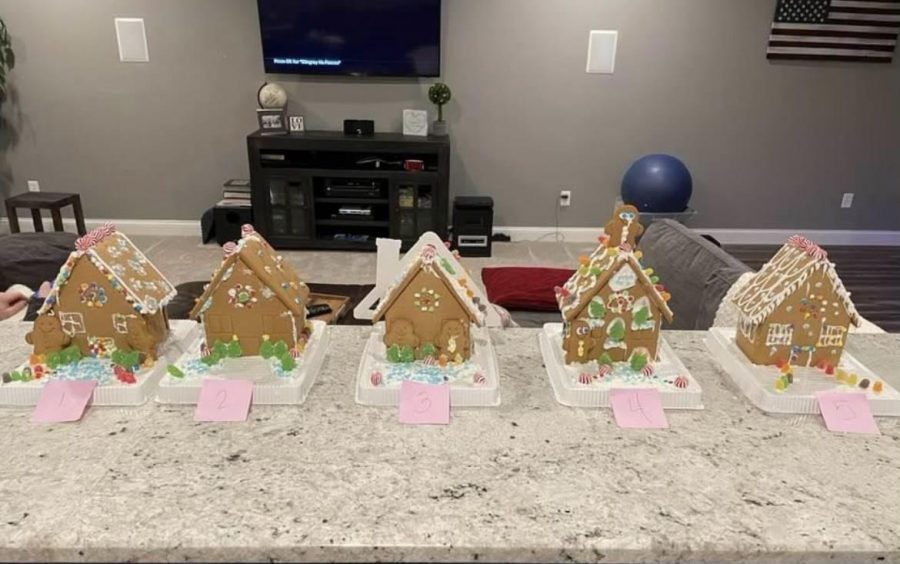 Senior Flynn Wiegners family ranks their gingerbread house winner.