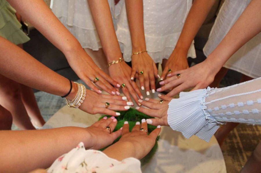 Some+girls+from+the+class+of+2022+showing+off+their+beautiful+new+rings+after+their+ceremony%21