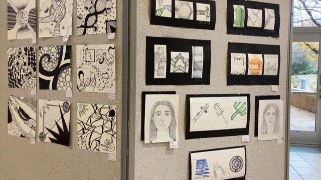 Various art works are being displayed for the art show. 
