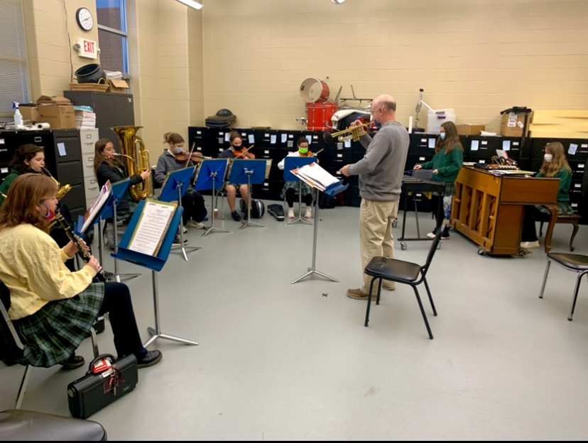 The Instrumental Ensemble group rehearsing for their concert, led by Mr. Medcalf. 