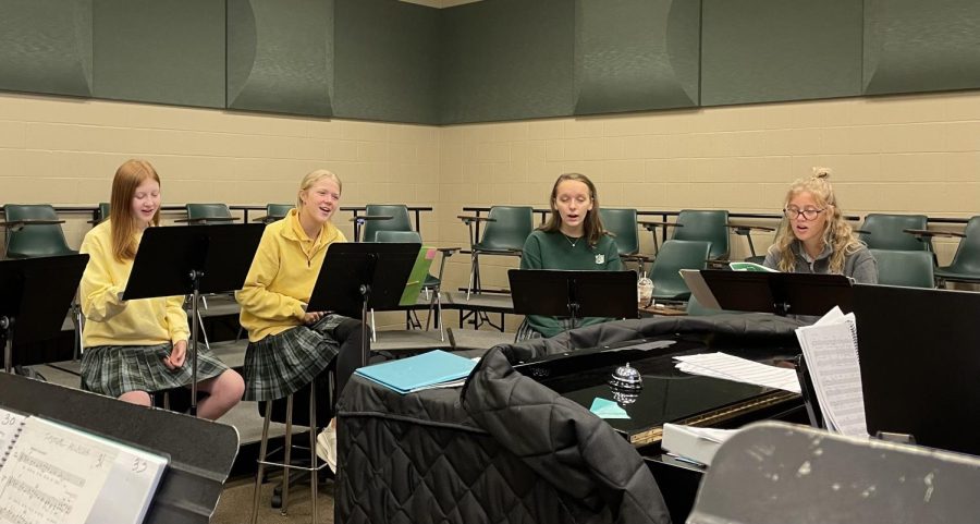 This image captures a few of the Frontenac Voices in their natural environment. Pictured (left to right): Senior Molly Thompson, Senior Natalie McAtee, Senior Erin Voigt, and Junior Meredith Dunn.