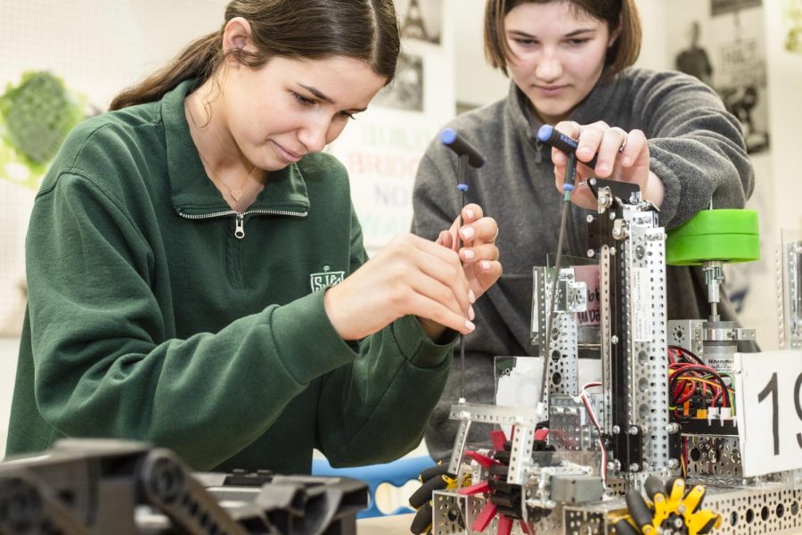 JoeBotics is a wonderful way for future engineers to expand their knowledge of elaborate machines (Pictured left to right: Sophomore Carolyn Mueller, Sophomore Alexandra Faerber).