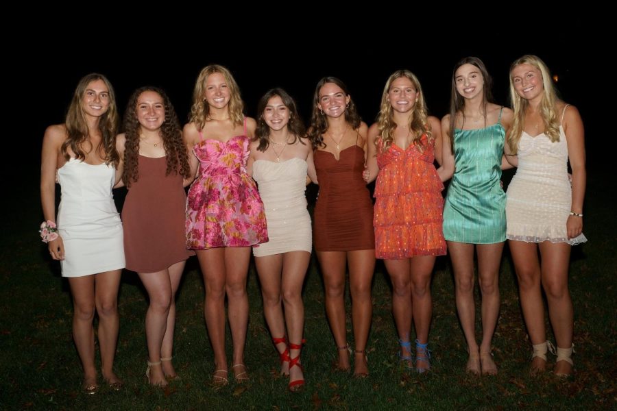 A group of St. Joe angels posing in their beautiful dresses for the Fall Ball dance.
