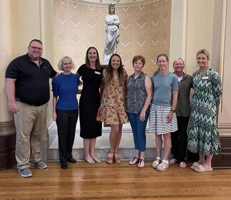 New faculty and staff (from left to right), Mr. Noll, Ms. Nasser, Ms. Chappell, Ms. Howley, Ms. Degenhart, Ms. Beekman, and Ms. Sullivan, enjoy a tour of the CSJ Motherhouse. 