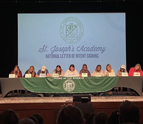 The athletes, (from left to right) Rylie Andrews, Maddie Bowman, Quinn Conroy, Anna Duncan, Sarah Gilmore, Abby Hickman, Kilian Kohl, Mia Martin, Annie Ryan, and Madison Smith, signing their National Letter of Intent. 
