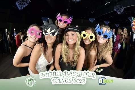 Seniors Catera Legrasso, Ellie Kerckhoff, Abigail Schoemehl, Emma Smith, Julia Rhodes, and Emma Woolcott taking advantage of one of the several photo booth opportunities.