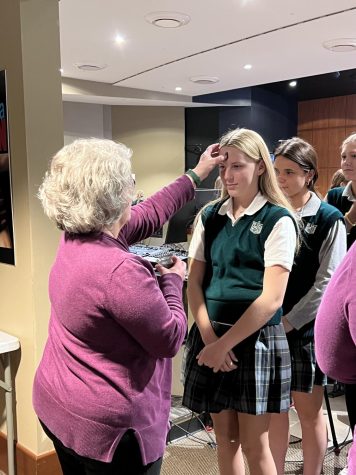 St. Joe students receive ashes on Ash Wednesday, marking the beginning of Lent.