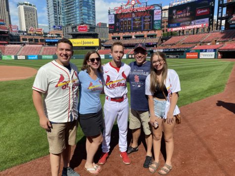 The Weishaar family cheering on the Cardinals at Busch Stadium