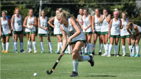 Senior Meredith Dunn carries the ball up the field.