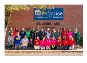 The 2023 Unite4Justice conference attendees pose in front of the site for their service.  