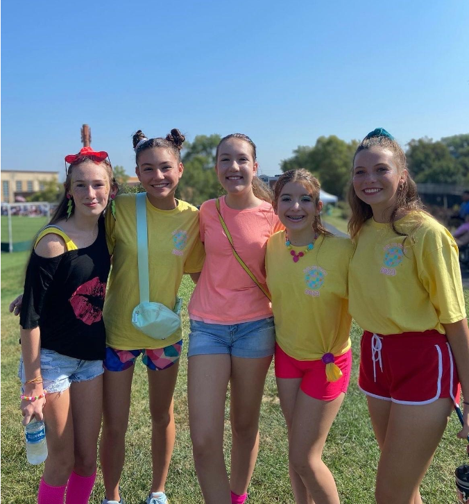 (from left to right) Freshmen Peyton Peters, Bella Sedlack, Amelia Trost, Caroline McQuaid, and Madelyn Emge dressed up in an 80s theme at the Villa vs. St. Joe field hockey game.