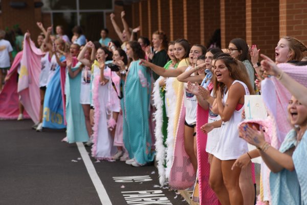 Seniors greet the underclassmen through the circle drive on St. Joe Day.