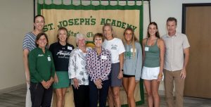 Group of St. Joe women and NBC broadcaster Steve Schlanger at the Reunion of Champions. 