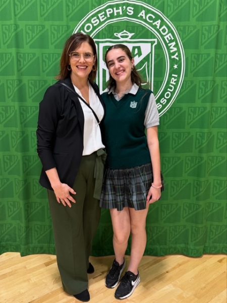 A mother and daughter together for a special morning at the Mother Daughter Mass.