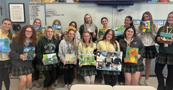 French 4 students show their work based on French Impressionism. 